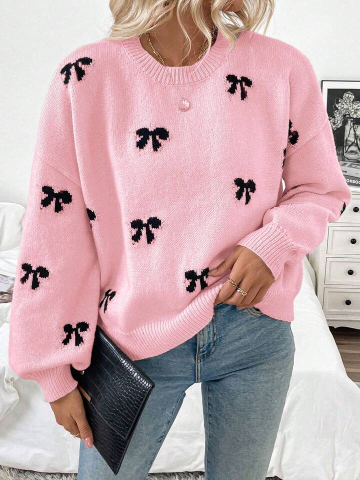 Pink Knit Sweater with Black Bow Pattern – Cozy Oversized Pullover