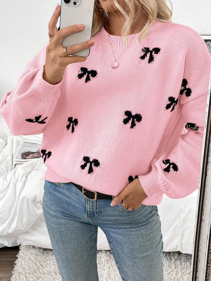 Pink Knit Sweater with Black Bow Pattern – Cozy Oversized Pullover